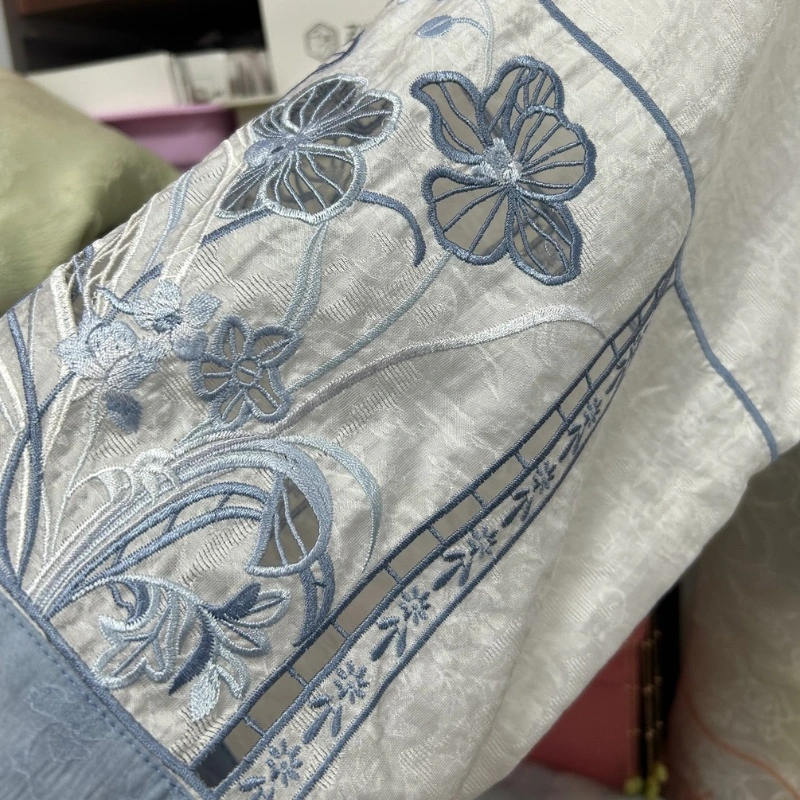 blue-floral-embroidery-on-white-linen-sleeve