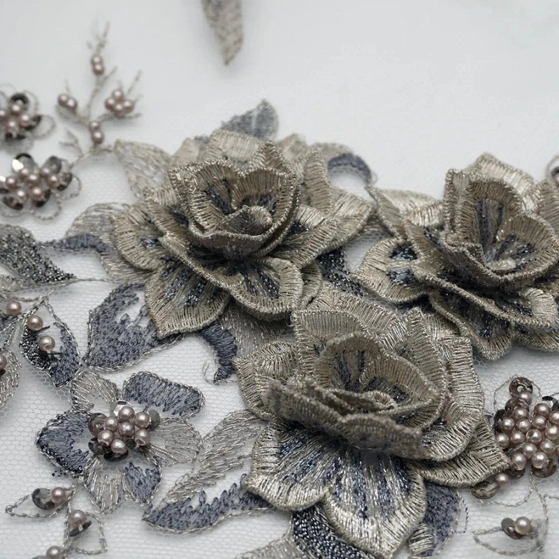 Decorative gold stitch badge