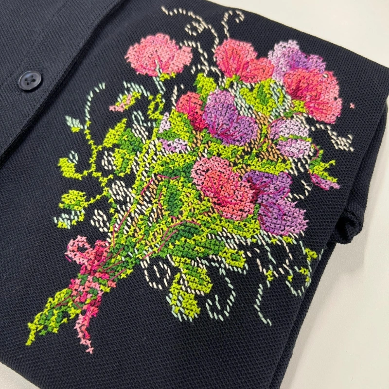 vibrant-floral-bouquet-embroidery-on-black-top.
