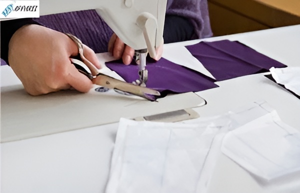 A designer sketching the clothing line before production.